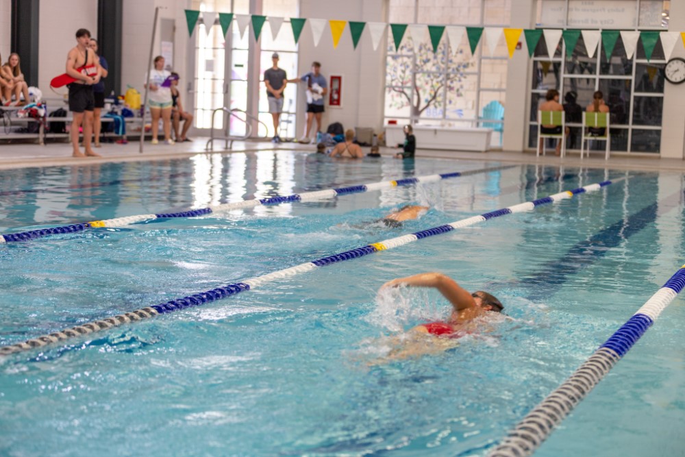 Competition Pool - lap swimmers swimming freestyle laps
