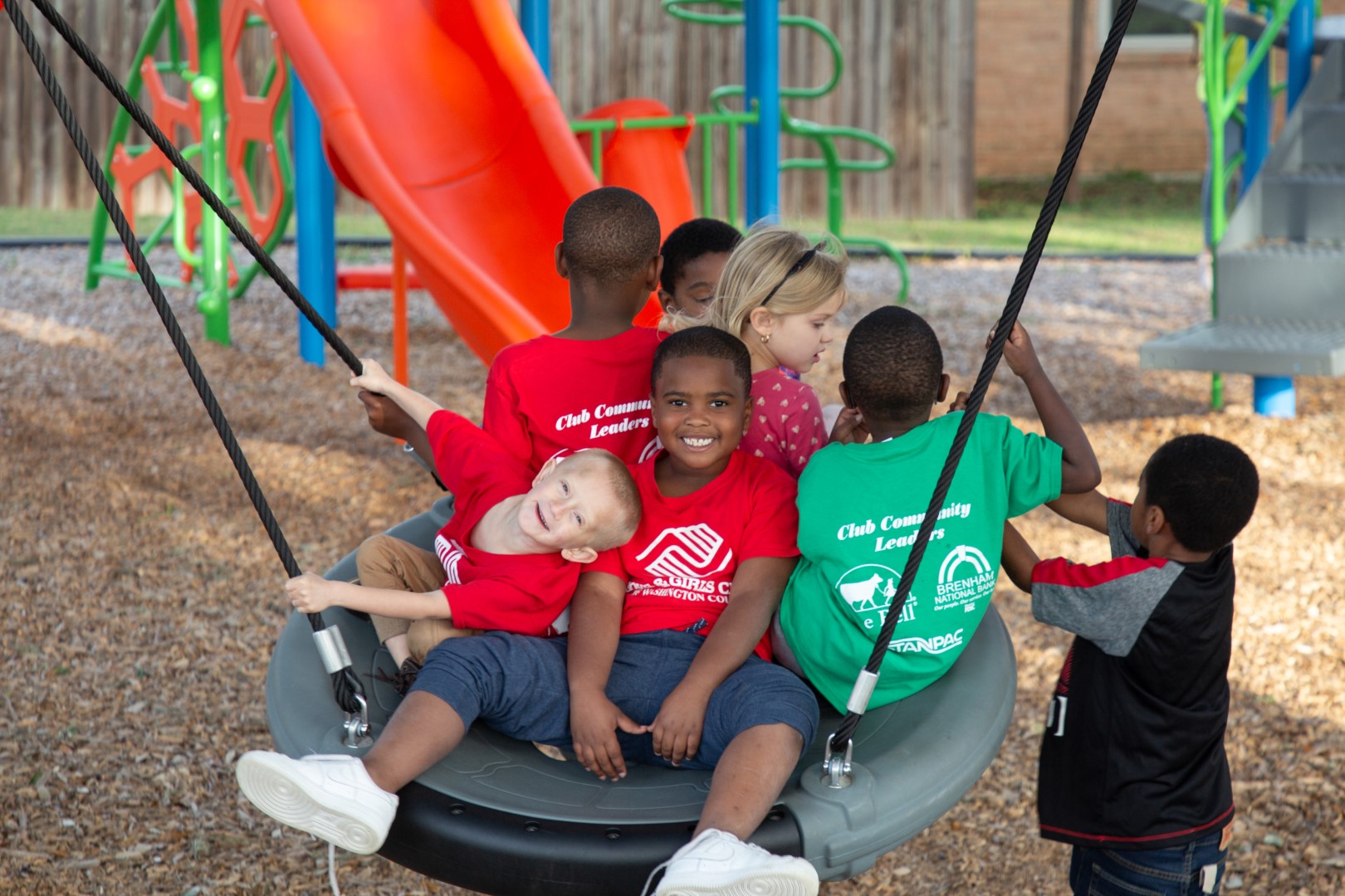 Kids playing on large swing