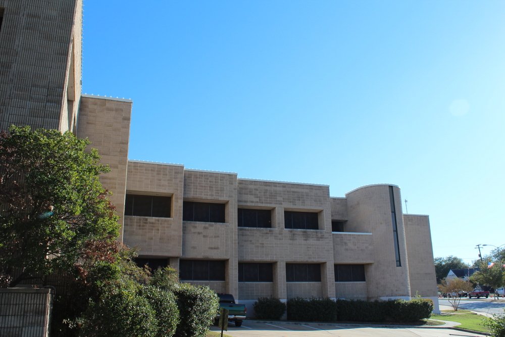 City hall building facing south while on North Park Street