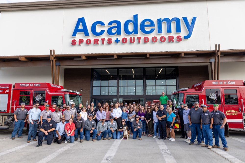 Academy Sports + Outdoors store front with City of Brenham staff