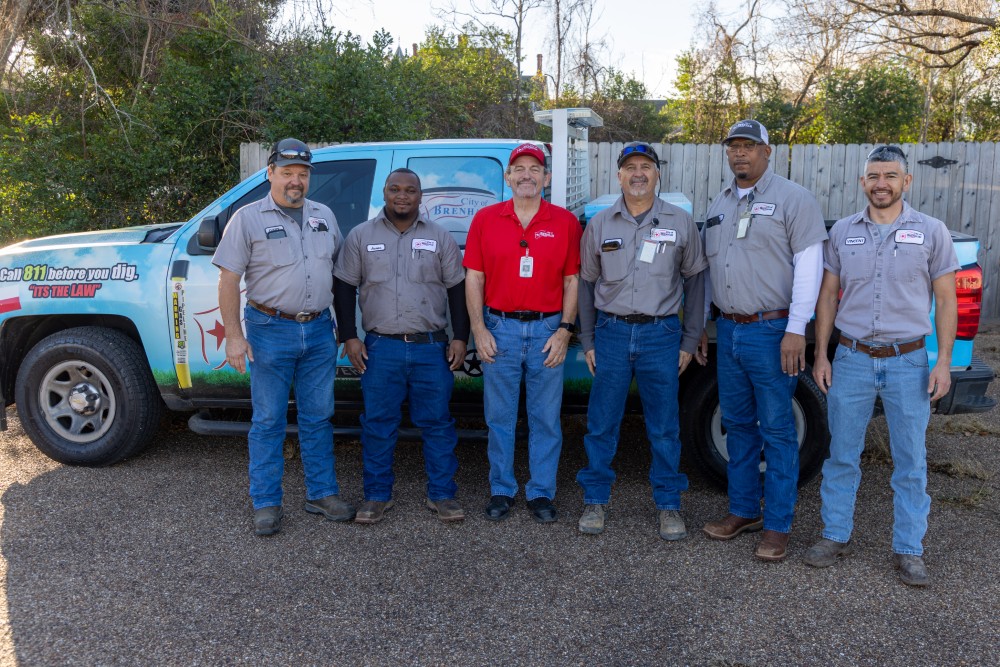Gas department staff (6 people) standing in front of truck