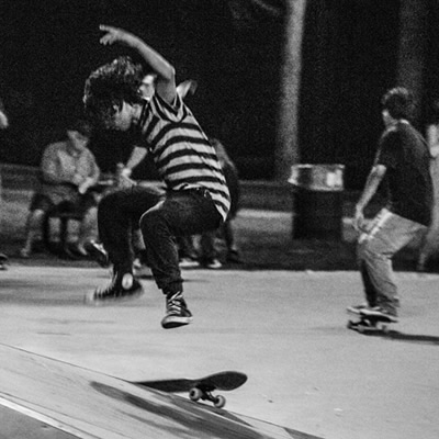 Skate boarders grinding in Fireman's Park